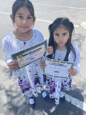 Both of my daughters loved kumon and have been achieving good grades in school .