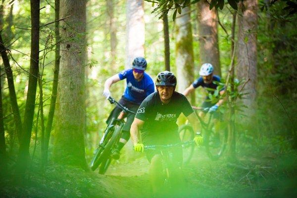 The crew from Squatch Bikes riding lower Black Mountain.