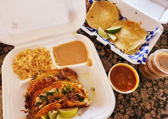 Queso birria taco plate, consome, carnitas mulitas, and salsa. Delicious!