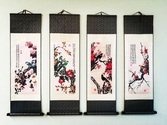 Spring, Summer, Fall, Winter scrolls in treatment room 2