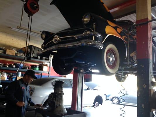 Gabe works on repairing a transmission for a classic. One of the many automotive repairs and services we offer at AAMCO Santa Clarita.