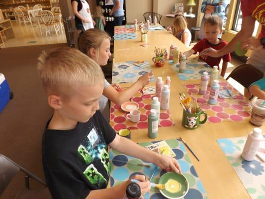 "Tea party" Kids paint their own tea cups at a birthday party