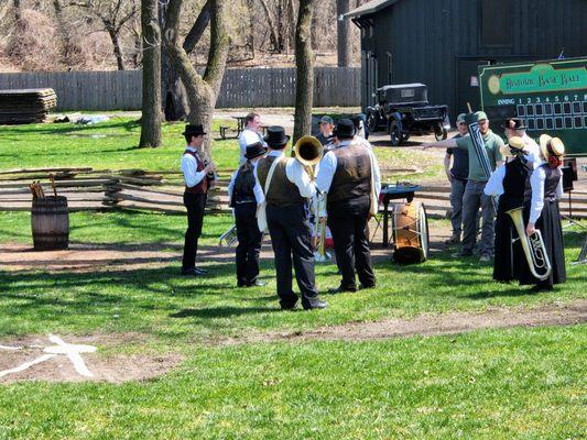 Band getting ready to play before the pick up old fashion base ball game