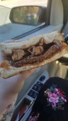 The "Cowboy Up!" - cheeseburger topped with onion rings and honey bbq sauce, in between two grilled cheese! Oh. My. God.