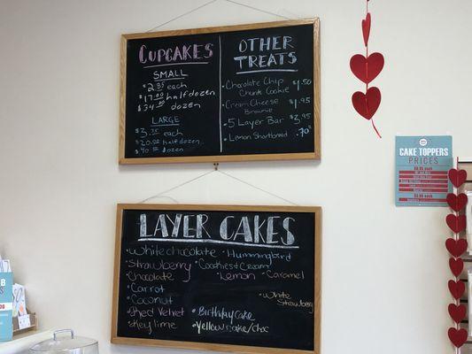 Status of what kind of cakes are being sold, and the pricing for cupcakes and other treats.