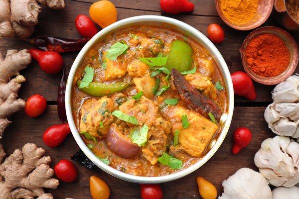 Kadai Chicken- tender chicken with veggies in a medium spicy sauce