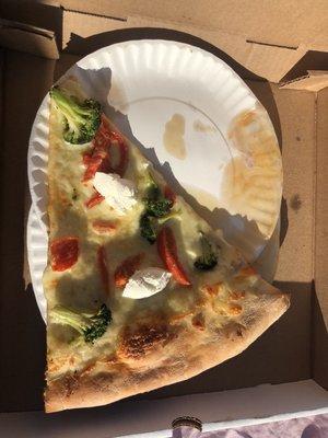 Vegetarian slice of white sauce with broccoli and bell peppers, and cheese