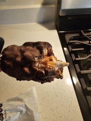 Marshmallow crispy dipped in chocolate (not good or fresh)