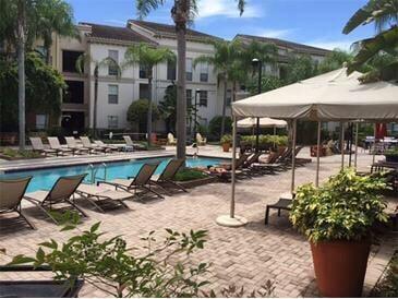 Cabanas and loungers surrounding the pool