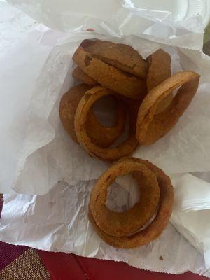 Onion rings not fully cooked.