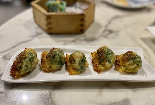 Shrimp and chive dumplings, check out that caramelization.