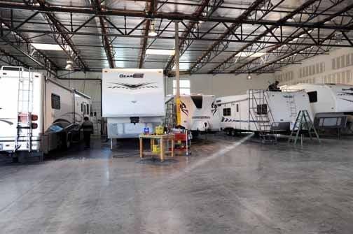 Fully enclosed RV service bays and RV repair bays