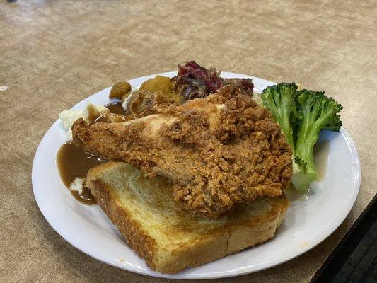 Friend chicken, toast, Mashed Potatoes and Gravy.