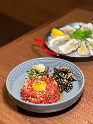 Yookhwe (Beef Tartare) - Raw beef, raw egg yolk, korean pear, crispy seaweed.