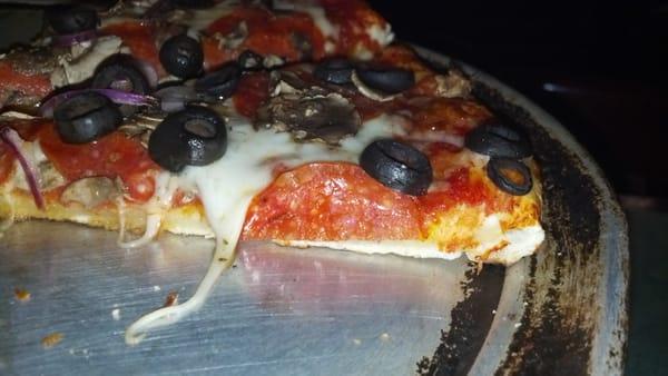 Pizza is good, but unfortunately this is as thick as the "thick crust" gets.  For a thin crust pizza this is good though!