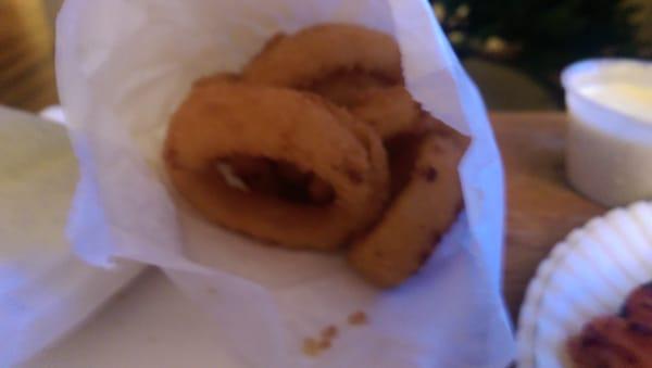 Onion rings. Served in a bag. With choice of dipping sauce