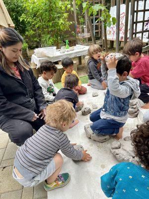 Exploring Clay on the floor with hands and feet!