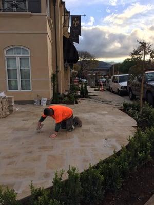 Installation of limestone over ditra membrane and landscaping in Los Altos, CA. (Enchante Boutique Hotel)