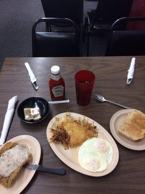 Chicken fried steak (very tender), overcooked eggs, rye toast, and burnt hashbrowns.