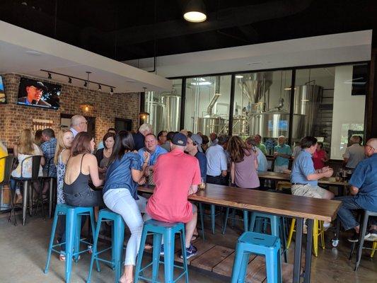 The main open area that dog legs around the bar to great views of the brewery