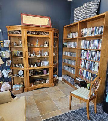 Our new shop has a beautiful library area containing books, cds, dvds, etc.