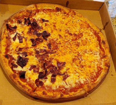 Half cheese,  half bacon pizza