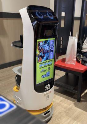 Drink is delivered by a robot. Very cute