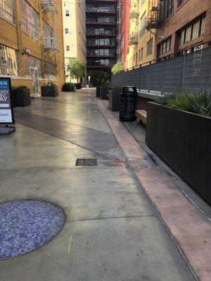 If you are looking for the leasing office, go down the alley way then turn right.