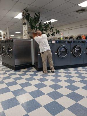 Mgr cleaning the machines at night, which shows as this place is sparkling clean