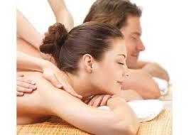 Couple relaxing/ therapeutic massage