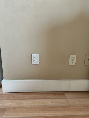 The new outlet on the left is a dedicated outlet for our heater so the bathroom lights won't flicker when the heater turns on.