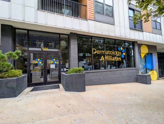 Outside. Storefront. Located on the ground level of the Cottonwood Westside apartment building.