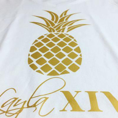 Matte gold vinyl on white shirts