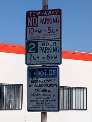 Signs by the parking lot