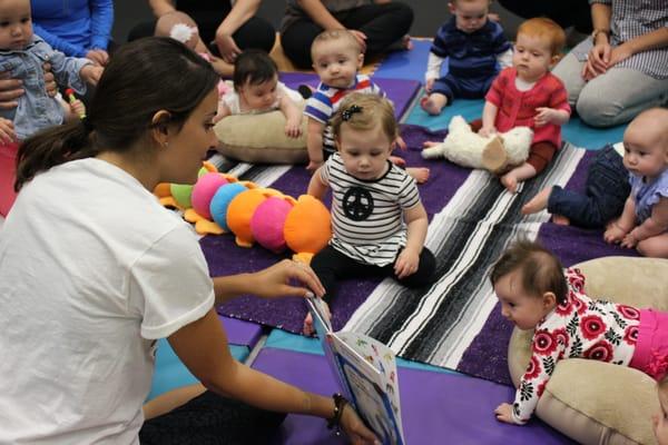 Story time is when the babies refocus their attention after a very active class of dance, play, and song.