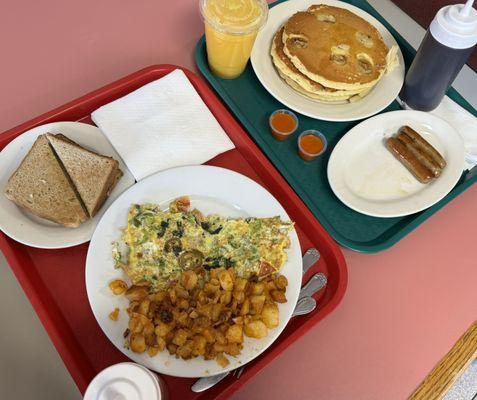 Veggie Omelettes Breakfast and banana buttermilk pancakes w/ side of sausage and large orange juice