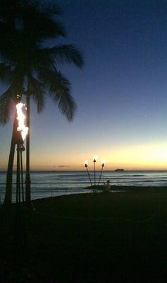 you'll want to watch the Torch Lighting Ceremony nightly at dusk on Waikiki Beach!