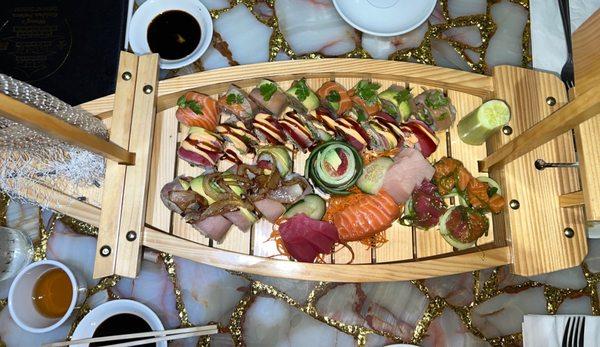 Chef's Special Sushi Boat!   So fresh and good customer service!   S5. Sashimi Mix (9 PIECES)