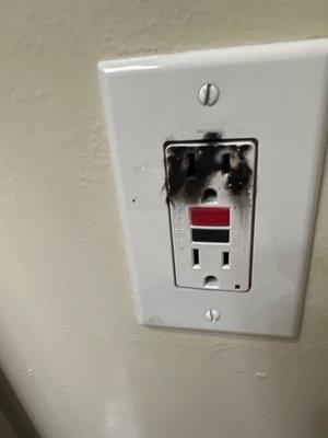 The bathroom socket that exploded and caught fire