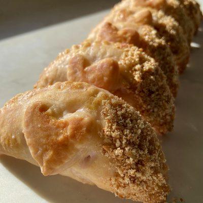 Strawberries and Cream Snack Pies with buttered pretzel sprinkle.