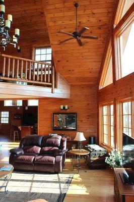 Log home great room in a 2000 sq ft chalet courtesy of Dorini LLC and Dorini Builders. www.dorinihomes.com