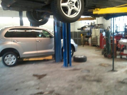 my poor car's on the lift :(