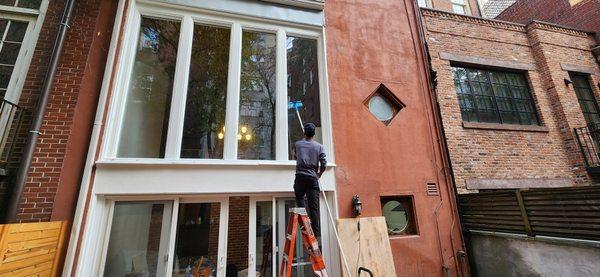 We are cleaning the exterior of the windows after the home renovation