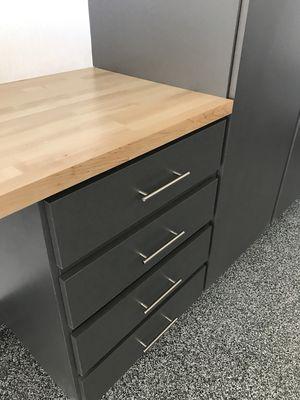 Graphite cabinets, stainless steel bars and optional butcher block top