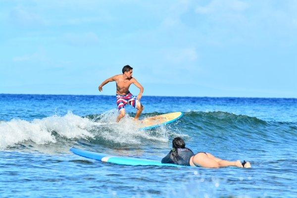 Are instructor Jonah catching a few waves with out students .