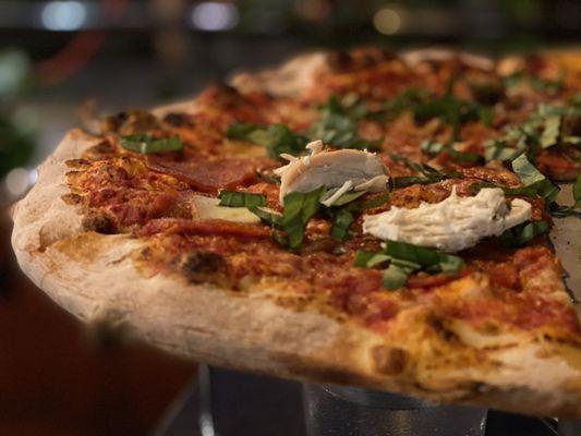 Margherita Pizza + extra basil, Pepperoni & house made sausage.