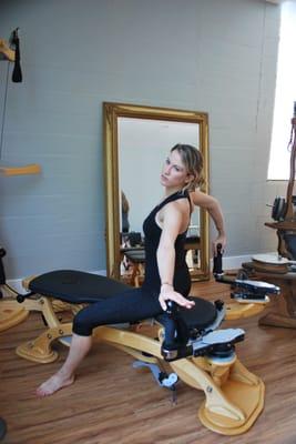 Erin practicing the GYROTONIC® method at Stillpoint Pilates Studio.