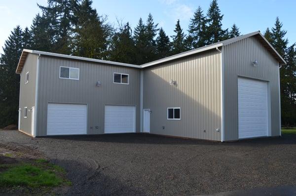 RV storage garage with attached 2 story shop space and apartment above.