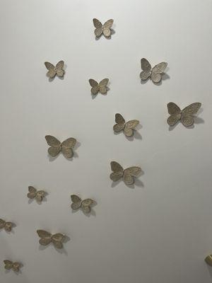 Omg their bathroom is so pretty I just had to take a photo of the butterflies going up the wall