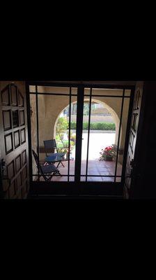 Looking out of custom swinging Screen doors